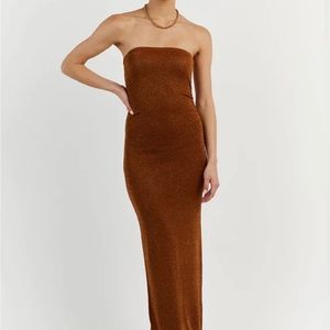 Size M, brand new with tags, gorgeous color with a slight sparkle, form fitting